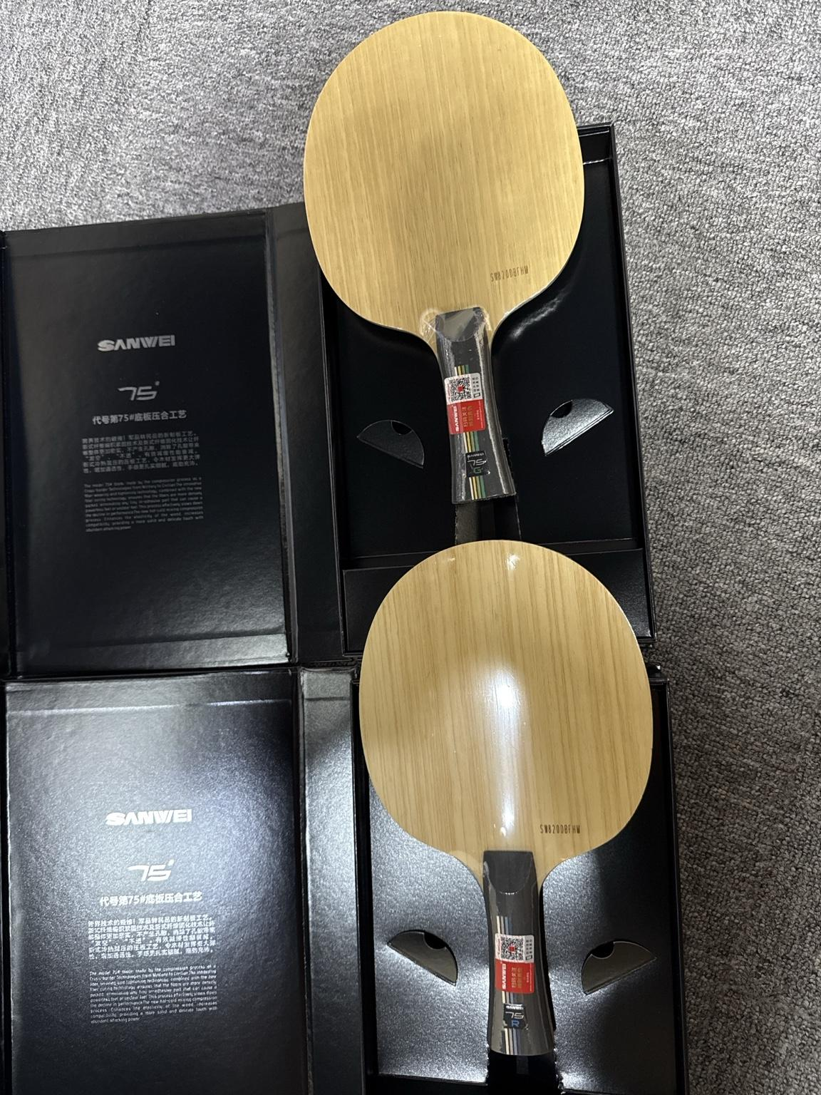 SANWEI 75G and 75R table tennis blades in their open presentation boxes